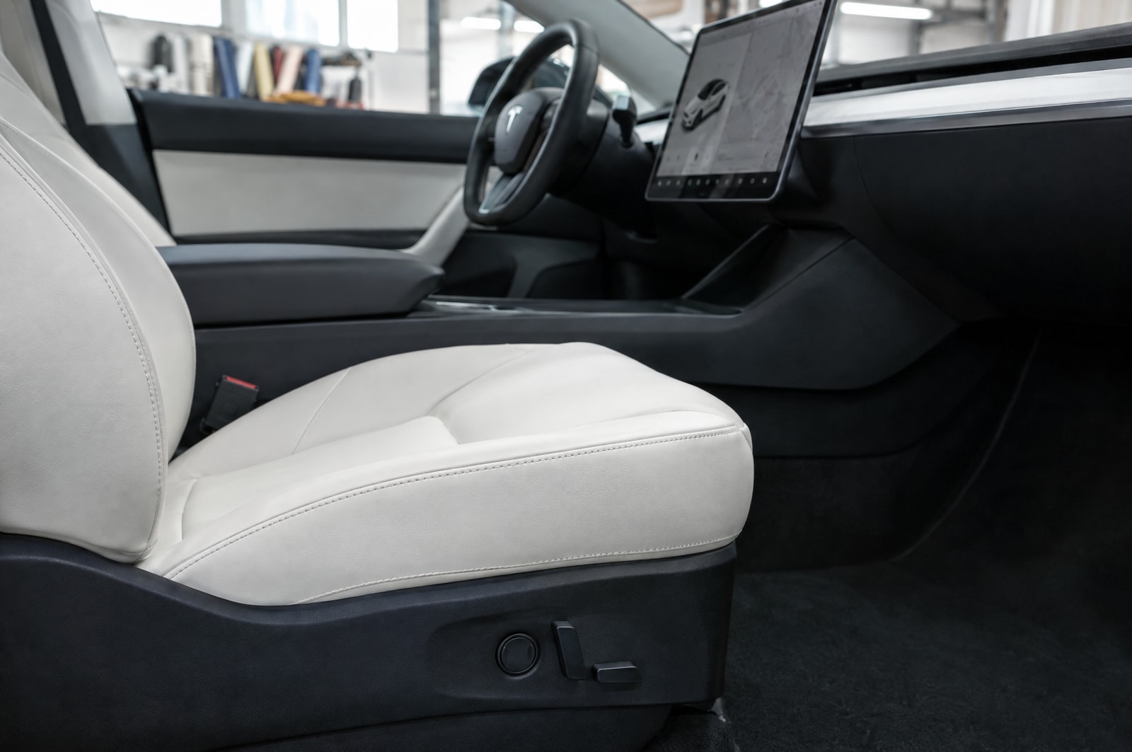White electric-car upholstery: Fit and finish · Motenza, Hollywood FL