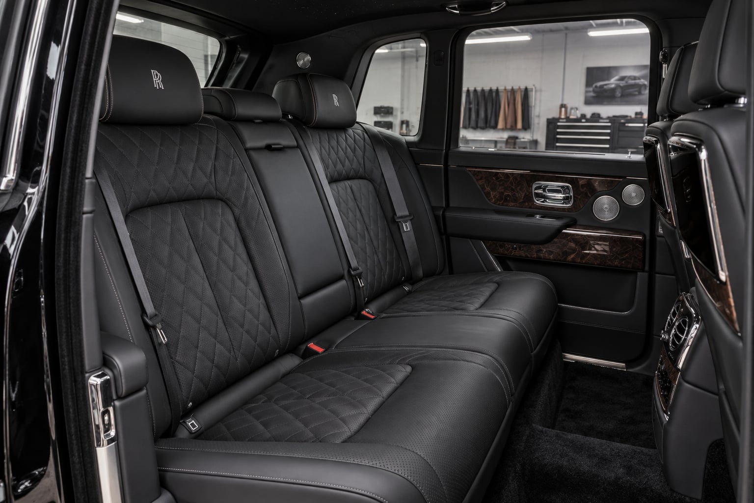 AI concept of Rolls-Royce Cullinan black quilted leather seats in an enclosed workshop