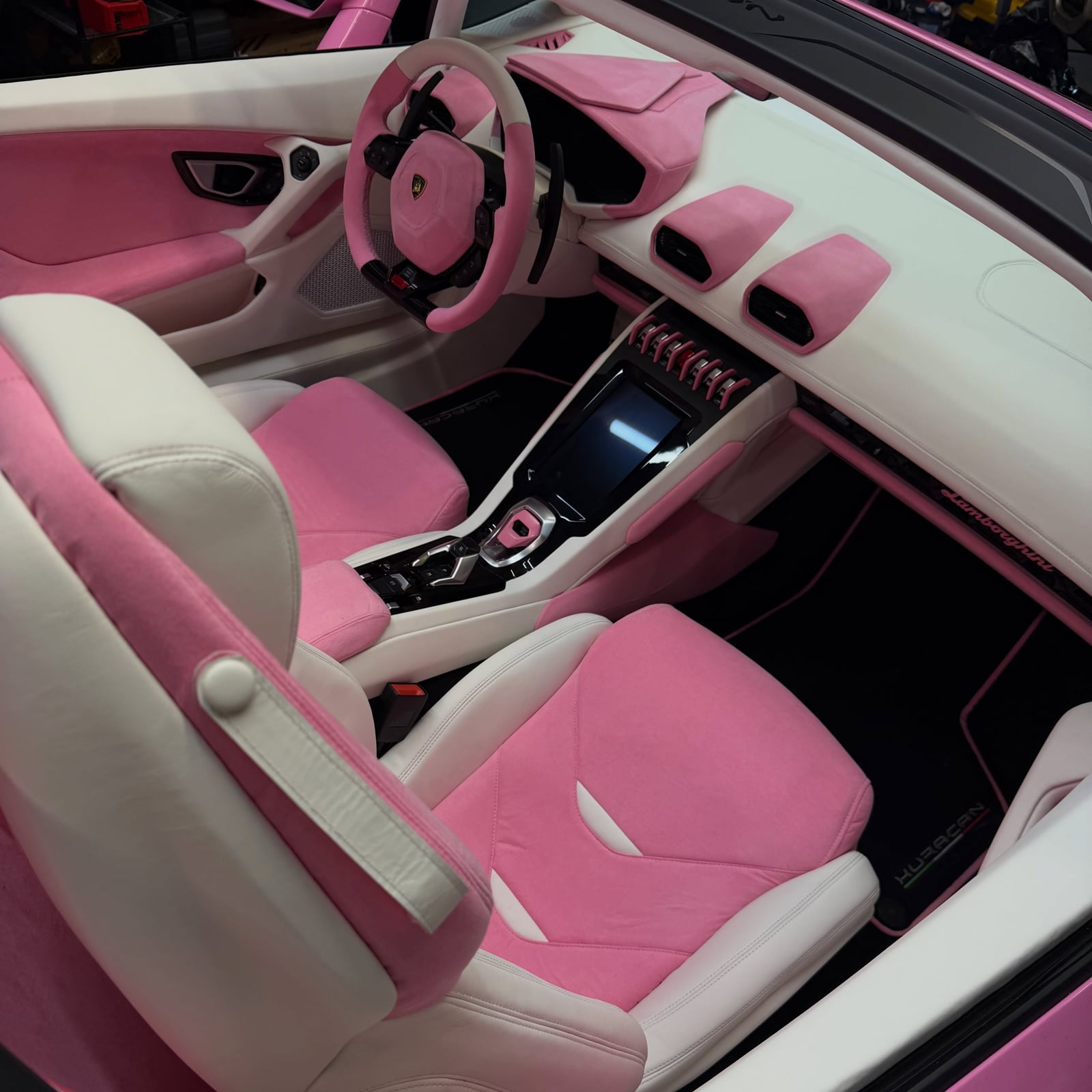 Completed Motenza Auto Couture project: white leather and pink Alcantara Lamborghini interior